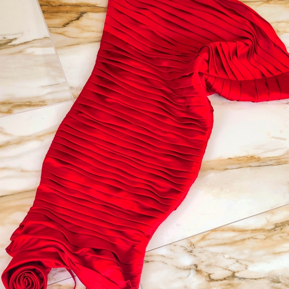 Paint the town crimson red. Drop dead gorgeous with a rosette on one shoulder.